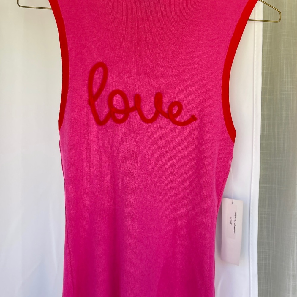Pink Sleeveless Top with Red Accents